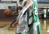 Springdale High’s Mytaah Crawford goes up for the shot as Van Buren’s Hooper Vint defends Thursday on Nov. 18 in Springdale.