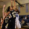 Rogers sophomore Taylor Strickland, right, tries to shoot over West Fork’s Melissa Jones during thei...
