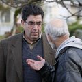 FBI special agent in charge of Oregon Arthur Balizan, left, speaks with Mozafar Wanly, head of the b...