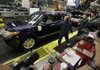 Amy Olvera prepares to drive a 2011 Ford Explorer off the assembly line Wednesday at Ford’s Chicago assembly plant. U.S. factory output grew again in November, the Institute for Supply Management reported.

 
