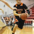 Gravette’s Colton Davis drives to the basket Wednesday while taking on Elkins during the Northwest A...