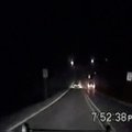 A still image from the video from a police cruiser's dashboard camera showing a high-speed chase on ...