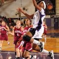 Fayetteville junior guard Sydney Conley, center, shoots a layup against Collierville, Tenn., during ...