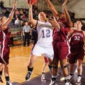 Fayetteville senior Emma Clay takes a shot in the lane as Collierville (Tenn.) senior Ashley Jones d...