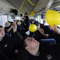 Davey Smith, right, and Aaron Risenhoover, both Bentonville offensive linemen, toss balloons around ...