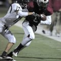 Bentonville senior defensive back Trevin Chavez tackles Springdale High junior wide receiver Henry H...
