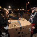 Fayetteville High School seniors Power, left, and Lauren McFalls construct the “Senior Shack” on Thu...