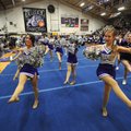 Fayetteville High School spirit squads warm up the crowd Thursday at a pep rally held to send off th...