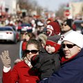The Morgan family of Rogers gathered to watch last year’s Winter Wonderland Parade in Bentonville. T...