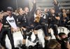 Bentonville players and fans celebrate after the Tigers defeated Fayetteville 49-28 in the Class 7A championship game Friday night at War Memorial Stadium in Little Rock.