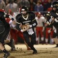 West Fork quarterback Dylan Harrison runs with the ball during the first half Friday against Rivercr...