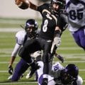  Bentonville's Drew Edwards tries to get away from Fayetteville's Ryan Starr Friday Dec. 3, 2010 dur...