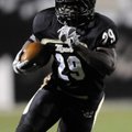  Bentonville running back Tearris Wallace rushes for a first down during the Tigers' 7A State Playof...
