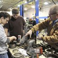  Dempsey Brown, right, automotive instructor for Northwest Technical Institute, instructs high schoo...