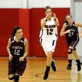 Siloam Springs forward Sarah Lowry passes the ball down court in a drive against Gentry on Saturday ...