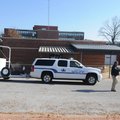 Chris Krodell, a University of Arkansas police officer, directs the Bentonville police bomb squad ve...