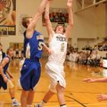 Bentonville guard Corbin Copeland, right, puts up a shot over Harrison’s Mikey Andreson on Tuesday i...