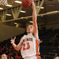 Rogers Heritage senior James Olinger puts a shot up against McDonald County, Mo., in the first half ...