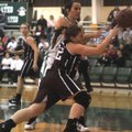 Gentry’s Terra Jones collides with Greenland’s Caitlyn Johnson on Tuesday in Greenland.