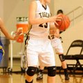 Bentonville forward Whitney Sandmann starts a drive downcourt against Harrison on Dec. 7 in Tiger Ar...