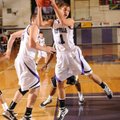 Fayetteville junior point guard Kile Graves pulls down a rebound during the Bulldogs’ game against L...