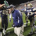 Shiloh Christian senior lineman Troy Goss, left, celebrates with coach Josh Floyd on Friday after th...