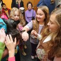 SCOUTS SHARE WITH SHELTER Teaghan Wharry, left, Emmielou Hays and Emily Ware, all members of Girl Sc...