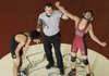 Springdale’s Jonathan Chan celebrates his victory over Little Rock Central’s Lerie Mendillo after a pin in the third period during the Northwest Arkansas Duels wrestling meet on Dec. 10 at Har-Ber High School in Springdale.