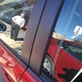 Andy Gilbride looks over cars that students at the University of Arkansas at Fayetteville can rent f...