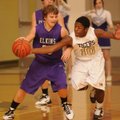 Bentonville guard William Worthey, right, tries to strip the ball from Elkins’ Mackenzie Leichner on...
