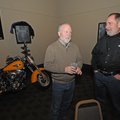 Nelson Driver, left, event director for Bikes, Blues & BBQ, visits Monday with Dan Hebert, board mem...