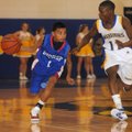 Springdale George’s Josten Peter drives downcourt against Springdale Central’s Treshawn Gause on Mon...