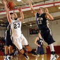 Pea Ridge’s Cameron Thompson takes the ball to the basket under pressure from Shiloh Christian’s Tay...