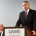 Peter Kohler (left), vice chancellor for University of Arkansas for Medical Sciences-Northwest Arkan...