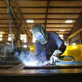 Charles Ray Osterhout welds metal Thursday at Cram-A-Lot in Springdale. Osterhout has commuted from ...