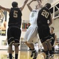 West Fork’s Cody Cone, left, and Logan Genz, right, try to block a shot by Bentonville’s Nick Smith ...