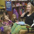 CHRISTMAS STORY Aaryn Elliott, a senior at Bentonville High School and the reigning Miss BHS, reads ...