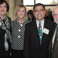 St. Edward Mercy neonatologist Dr. Victor Coloso, second from right, is joined by Ronald McDonald Ho...