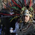 Leonardo Lopez, an Aztec dancer with St. Raphael Catholic Church, dances Dec. 12 during the fifth an...