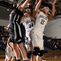 Shiloh Christian’s Lindsey Roe, right, grabs a rebound in front Siloam Springs’ Shelbi Honeycutt, le...