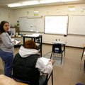 Amy Steele teaches geometry to Decatur High School sophomores and juniors, writing out the Pythagore...