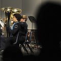 The Springdale Har-Ber Band performs on stage during a Christmas concert Dec. 6 in Springdale. Band ...