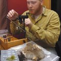 Zack Hoyt of Pea Ridge ties flies he’ll use to catch trout at the White River below Beaver Dam and o...