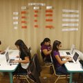 In this photo taken Monday, Oct. 25, 2010, students work at their computers in a classroom at the Ch...