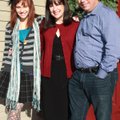Steve and Kelly Zega, from right, and Haley Zega welcome guests to their home for the seventh annual...
