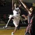 Fayetteville sophomore Jawan Smith shoots over a Clear Brook, Texas, defender in the first half Mond...