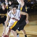 Rogers Heritage’s Jonathan Warner drives around Trent Hayes of Diamond, Mo., in the second half Mond...