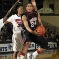 Springdale High sophomore Chasen Williamson drives to the basket in front of Tulsa (Okla.) Union jun...
