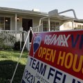 In this Nov. 4, 2010 photo, an open house sign is seen on the front lawn of a home for sale in Los A...