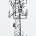 Chris Pickering, left, and Jamie Kelley, both of Kansas City, Mo., and installers for ALT Inc., scal...